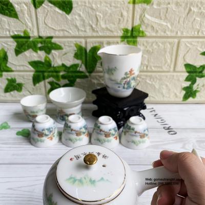 Bộ Ấm Chén Sơn Thủy Tay Tẩu Viền Vàng